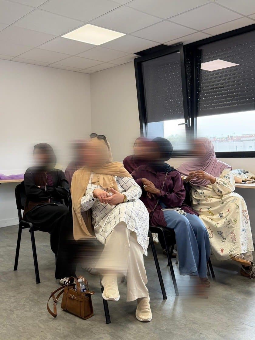 Participantes assises écoutant une intervention lors d’un atelier du Cercle
